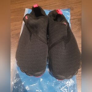 Aqua shoes size 9. New.  Water shoes
